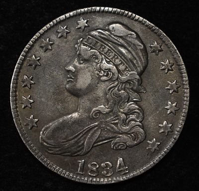 1834 CAPPED BUST HALF DOLLAR AU. WEEKLY COIN & CURRENCY AUCTIONS ESTIMATE $330 - $380.