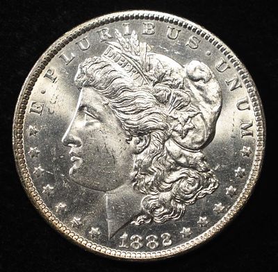 1882-CC MORGAN DOLLAR GEM BU PL. WEEKLY COIN & CURRENCY AUCTIONS ESTIMATE $925 - $1150.