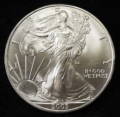2003 AMERICAN SILVER EAGLE. TOP RATED AUCTION HOUSE ESTIMATE $130 - $180.