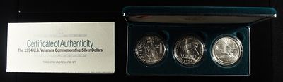 1994-W U.S VETERANS COMMEM SILVER DOLLAR SET. BID WITH SILVER CITY AUCTIONS ESTIMATE $200 - $250.