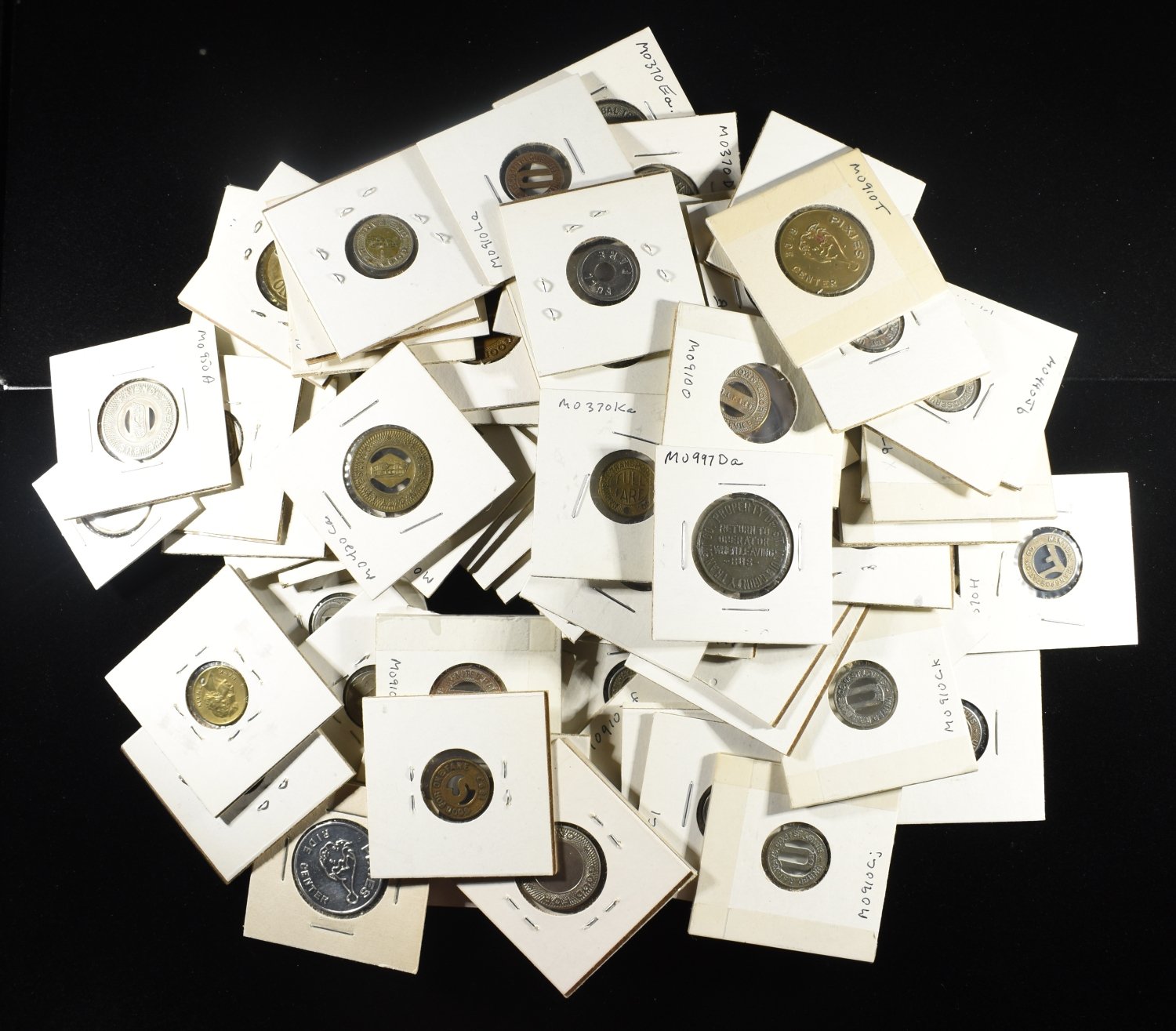 (74) MISC TOKENS