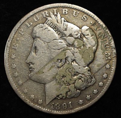 1891-O MORGAN DOLLAR. LEADERS IN ON-LINE AUCTIONS ESTIMATE $90 - $130.
