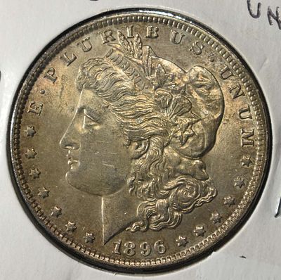 1896 MORGAN DOLLAR. LEADERS IN ON-LINE AUCTIONS ESTIMATE $90 - $130.