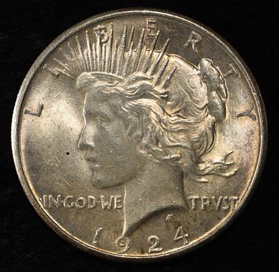 1924 PEACE DOLLAR. BID WITH SILVER CITY AUCTIONS ESTIMATE $90 - $130.