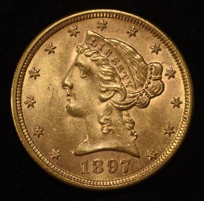 1897 $5 LIBERTY GOLD GEM BU. CHECK OUT OUR UPCOMING AUCTIONS ESTIMATE $2100 - $2600.