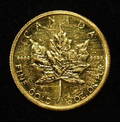 1985 $5 GOLD 1/10TH OZ MAPLE LEAF. BID WITH SILVER CITY AUCTIONS ESTIMATE $700 - $800.