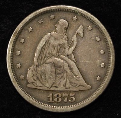 1875 20-CENT LIBERTY SEATED. CHECK OUT OUR UPCOMING AUCTIONS ESTIMATE $350 - $400.