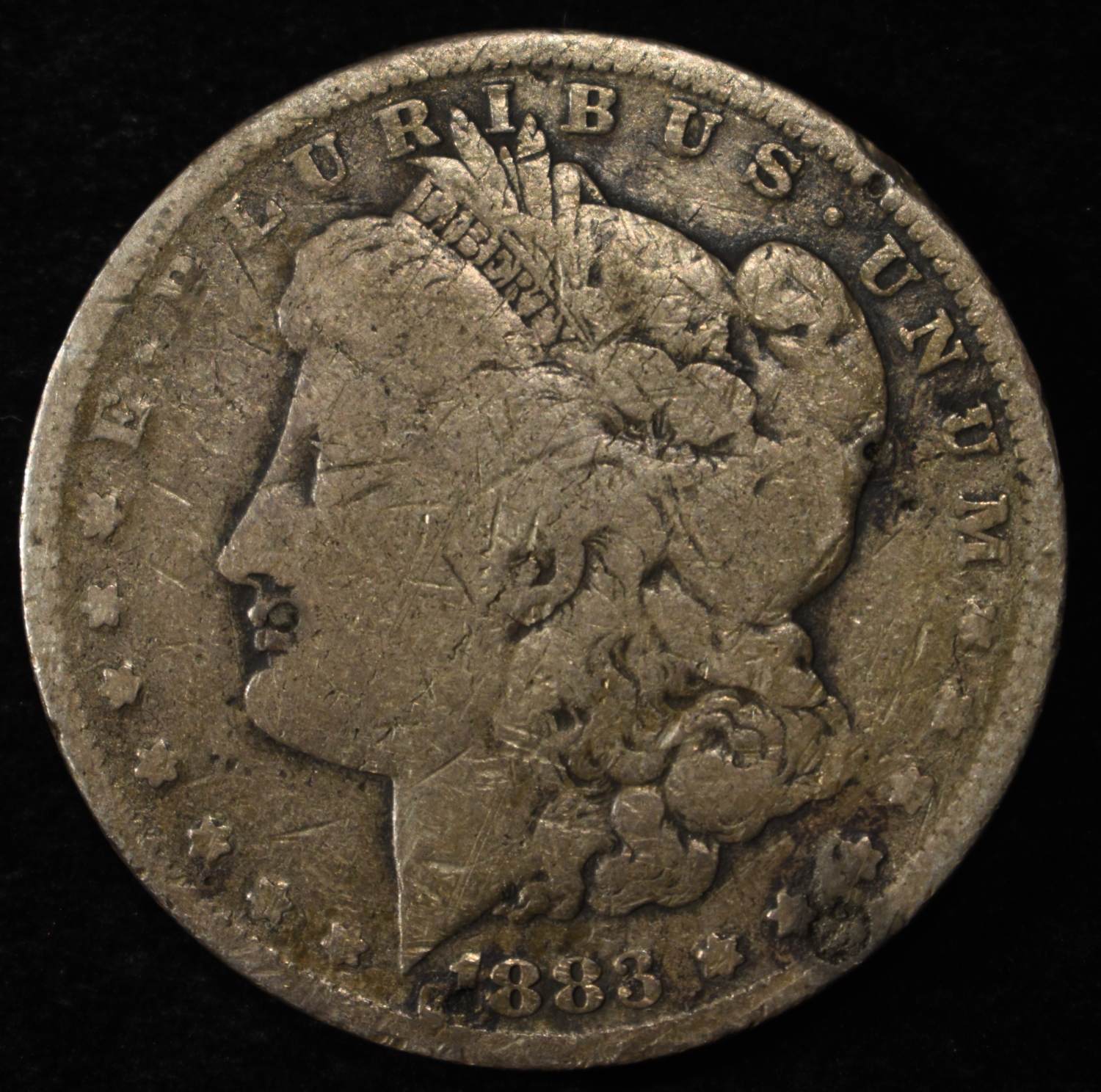 1883-O MORGAN DOLLAR DAMAGED