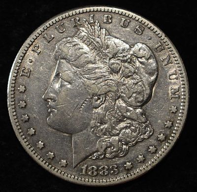 1883-S MORGAN DOLLAR XF. WEEKLY COIN & CURRENCY AUCTIONS ESTIMATE $80 - $100.