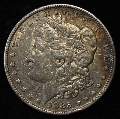 1885 MORGAN DOLLAR. TOP RATED AUCTION HOUSE ESTIMATE $75 - $100.