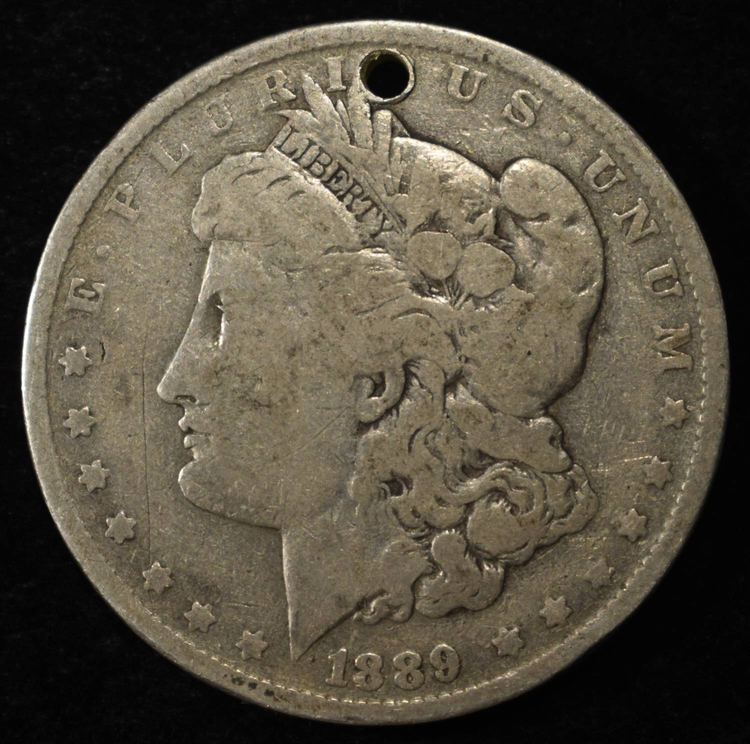 1889-O MORGAN DOLLAR HOLE