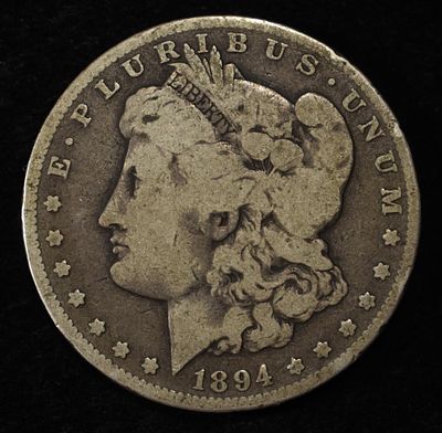 1894-O MORGAN DOLLAR VG. WEEKLY COIN & CURRENCY AUCTIONS ESTIMATE $80 - $100.