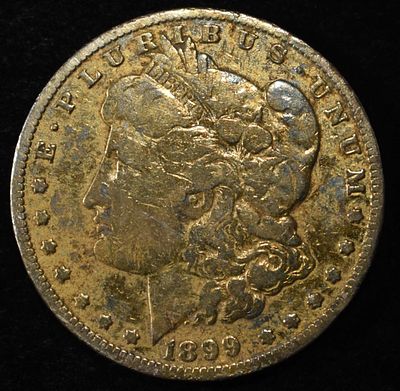 1899-O MORGAN DOLLAR. LEADERS IN ON-LINE AUCTIONS