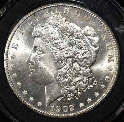 1902-O MORGAN DOLLAR CH BU. WEEKLY COIN & CURRENCY AUCTIONS ESTIMATE $100 - $130.