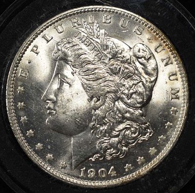 1904-O MORGAN DOLLAR CH BU. CHECK OUT OUR UPCOMING AUCTIONS ESTIMATE $100 - $130.