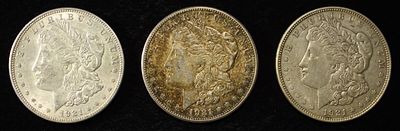 1921-P, D, & S MORGAN DOLLAR. BID WITH SILVER CITY AUCTIONS ESTIMATE $230 - $280.