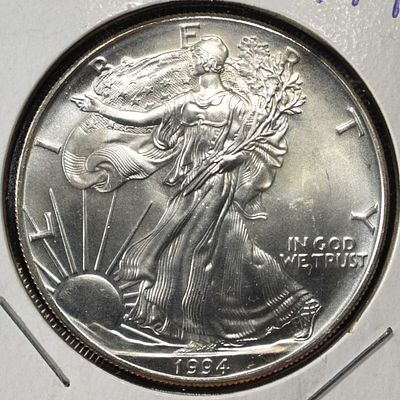 1994 AMERICAN SILVER EAGLE. TOP RATED AUCTION HOUSE ESTIMATE $100 - $150.