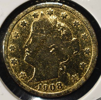 1908 'V' NICKEL GOLD PLATED AU/BU. CHECK OUT OUR UPCOMING AUCTIONS ESTIMATE $90 - $130.