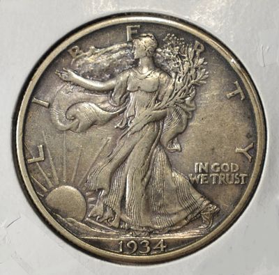 1934-S WALKING LIBERTY HALF DOLLAR CH AU/UNC. BID WITH SILVER CITY AUCTIONS ESTIMATE $310 - $360.
