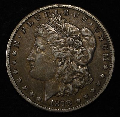 1878-CC MORGAN DOLLAR XF. LEADERS IN ON-LINE AUCTIONS ESTIMATE $300 - $350.