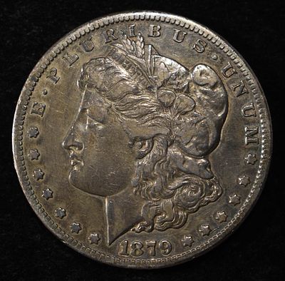1879-CC MORGAN DOLLAR XF. CHECK OUT OUR UPCOMING AUCTIONS ESTIMATE $2300 - $2800.