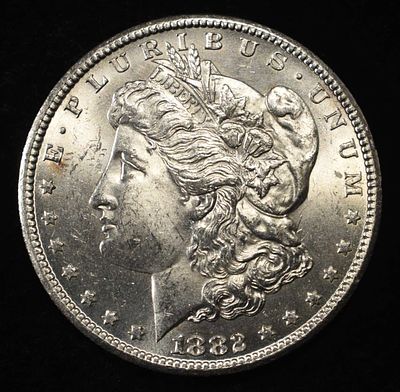 1882-CC MORGAN DOLLAR CH BU. LEADERS IN ON-LINE AUCTIONS ESTIMATE $350 - $400.