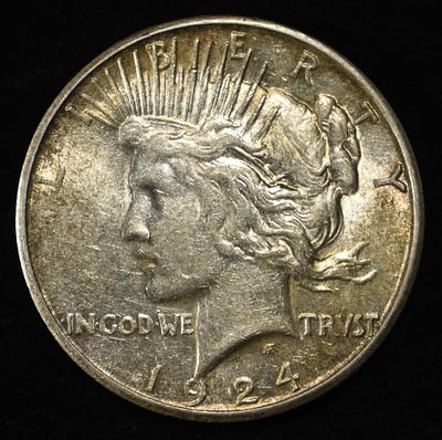 1924-S PEACE DOLLAR CH AU. LEADERS IN ON-LINE AUCTIONS ESTIMATE $100 - $130.