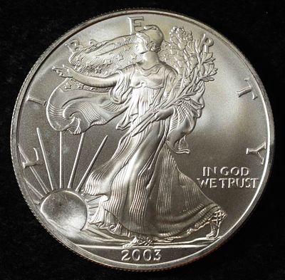 2003 AMERICAN SILVER EAGLE. WEEKLY COIN & CURRENCY AUCTIONS ESTIMATE $130 - $180.