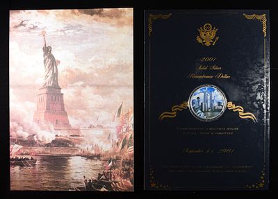 2001 REMEMBRANCE COLOR SOLID SILVER DOLLAR. LEADERS IN ON-LINE AUCTIONS ESTIMATE $120 - $170.