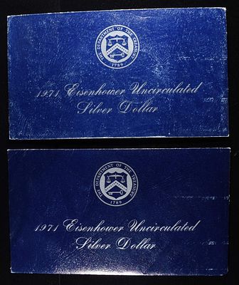 (2) 1971 EISENHOWER UNC SILVER DOLLAR. ESTIMATE $60 - $80.