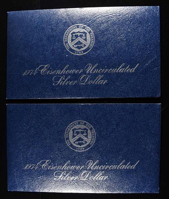 (2) 1974 EISENHOWER UNC SILVER DOLLAR. LEADERS IN ON-LINE AUCTIONS ESTIMATE $60 - $80.