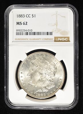 1883-CC MORGAN DOLLAR NGC MS-62. LEADERS IN ON-LINE AUCTIONS ESTIMATE $400 - $500.