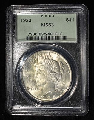 1923 PEACE DOLLAR PCGS MS63. CHECK OUT OUR UPCOMING AUCTIONS ESTIMATE $130 - $180.