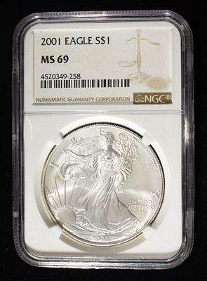 2001 AMERICAN SILVER EAGLE NGC MS69. CHECK OUT OUR UPCOMING AUCTIONS ESTIMATE $110 - $160.