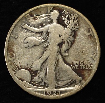 1921-S WALKING LIBERTY HALF DOLLAR VG. WEEKLY COIN & CURRENCY AUCTIONS ESTIMATE $130 - $150.