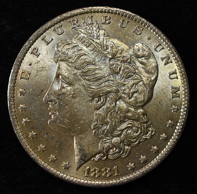 1881-O MORGAN DOLLAR BU. BID WITH SILVER CITY AUCTIONS ESTIMATE $100 - $130.