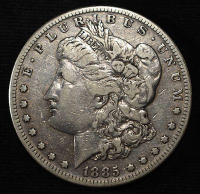 1885-S MORGAN DOLLAR VF. LEADERS IN ON-LINE AUCTIONS ESTIMATE $100 - $130.