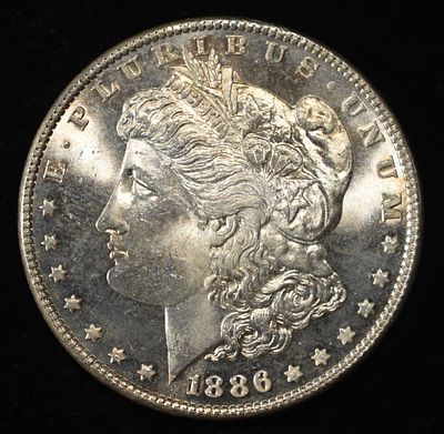 1886 MORGAN DOLLAR GEM BU PROOFLIKE. WEEKLY COIN & CURRENCY AUCTIONS ESTIMATE $390 - $440.