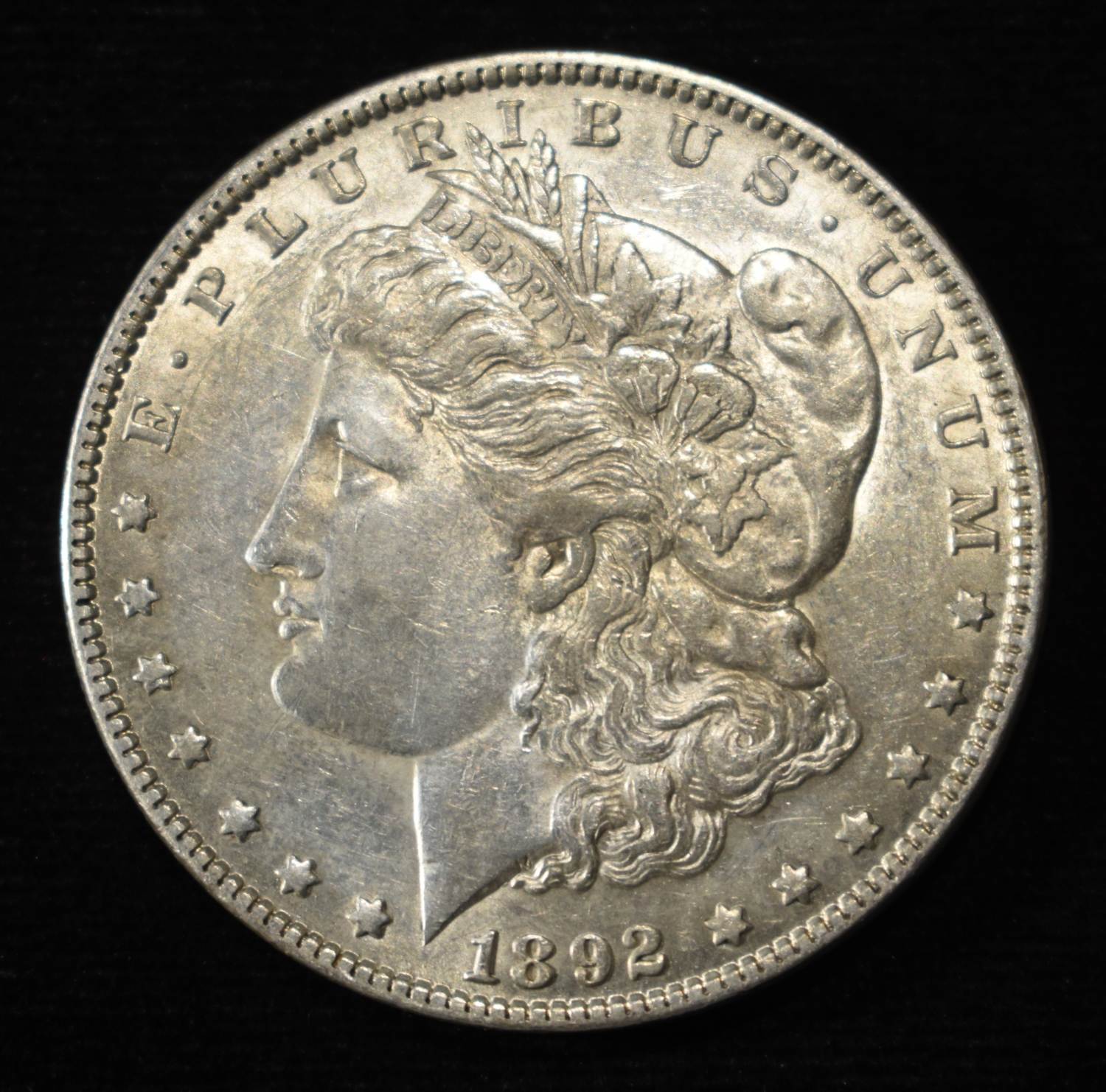 1892 MORGAN DOLLAR AU
