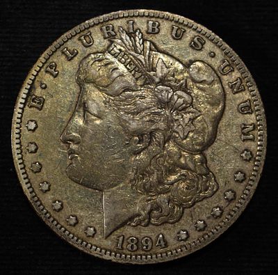 1894-O MORGAN DOLLAR XF. BID WITH SILVER CITY AUCTIONS ESTIMATE $170 - $220.