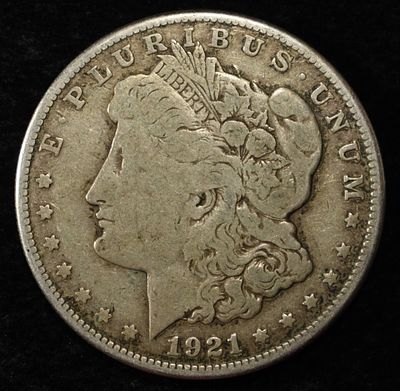 1921 MORGAN DOLLAR. CHECK OUT OUR UPCOMING AUCTIONS ESTIMATE $90 - $130.