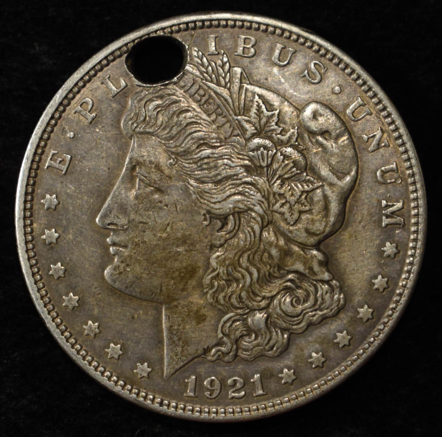 1921-D MORGAN DOLLAR DAMAGED
