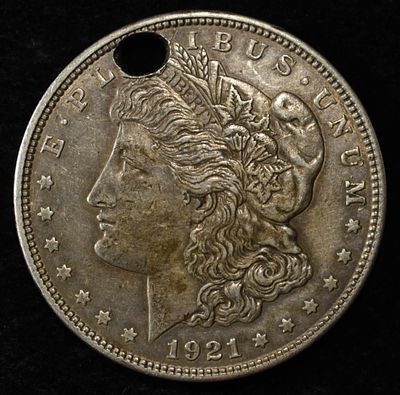 1921-D MORGAN DOLLAR DAMAGED. BID WITH SILVER CITY AUCTIONS ESTIMATE $90 - $130.