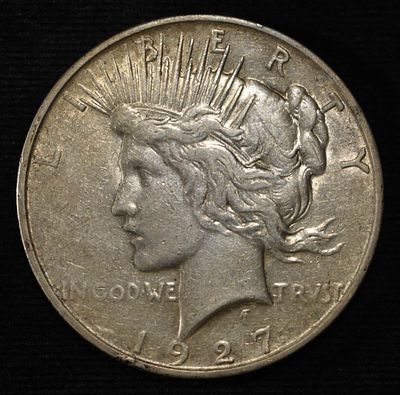 1927-D PEACE DOLLAR XF. LEADERS IN ON-LINE AUCTIONS ESTIMATE $80 - $100.