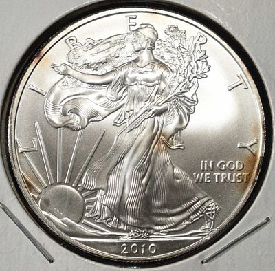 2010 AMERICAN SILVER EAGLE. LEADERS IN ON-LINE AUCTIONS ESTIMATE $100 - $150.