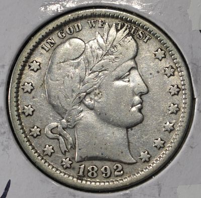 1892 BARBER QUARTER XF/AU. CHECK OUT OUR UPCOMING AUCTIONS ESTIMATE $90 - $130.