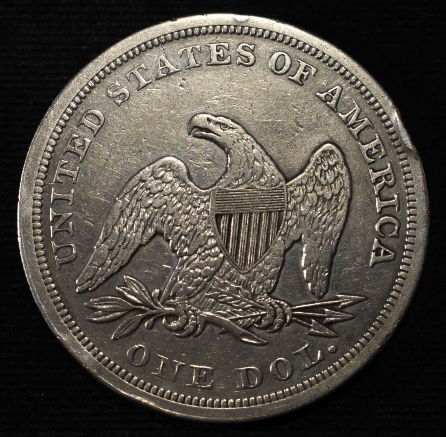 1845 LIBERTY SEATED DOLLAR AU