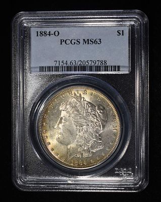 1884-O MORGAN DOLLAR PCGS MS-63. BID WITH SILVER CITY AUCTIONS ESTIMATE $130 - $150.