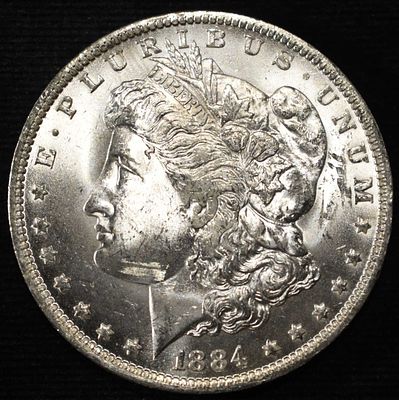 1884-O MORGAN DOLLAR BU. TOP RATED AUCTION HOUSE ESTIMATE $130 - $150.