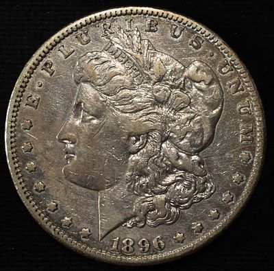 1896-S MORGAN DOLLAR AU. CHECK OUT OUR UPCOMING AUCTIONS ESTIMATE $1400 - $1500.